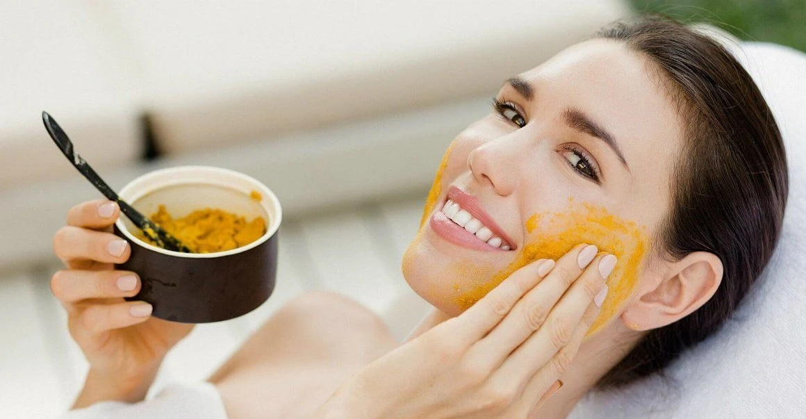 young lady turmeric facial